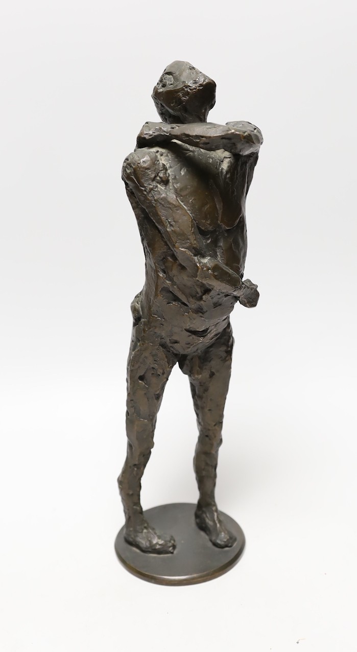 Bronze: pressed mark stamped to right ankle, one of nine, a figural male nude bronze, 35cms high